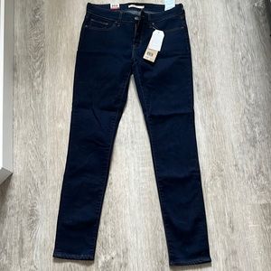 Levi Mid Rise Skinny 711